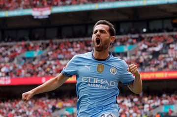 Soccer Football - Community Shield - Manchester United v Manchester City - Wembley Stadium, London, Britain - August 10, 2024 Manchester City's Bernardo Silva celebrates scoring their first goal Action Images via Reuters/Andrew Couldridge