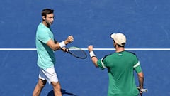 Marcel Granollers choca el puño con Horacio Zeballos en su partido de dobles del US Open contra Herbert y Mahut.