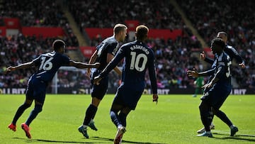 Manchester United's Dutch defender #04 Matthijs de Ligt (C) celebrates after scoring his team first goal during the English Premier League football match between Southampton and Manchester United at St Mary's Stadium in Southampton, southern England on September 14, 2024. (Photo by Glyn KIRK / AFP) / RESTRICTED TO EDITORIAL USE. No use with unauthorized audio, video, data, fixture lists, club/league logos or 'live' services. Online in-match use limited to 120 images. An additional 40 images may be used in extra time. No video emulation. Social media in-match use limited to 120 images. An additional 40 images may be used in extra time. No use in betting publications, games or single club/league/player publications. /