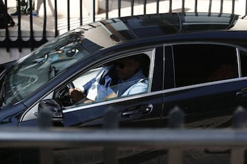 Real Madrid's Portuguese forward Cristiano Ronaldo arrives in a vehicle with tinted windows to appear at a court.