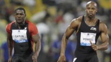 Gatlin y Powell, ayer en Doha.