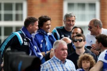 LONDON, ENGLAND - MAY 25:  Chelsea manager Jose Mourinho shares a joke with colleagues duing the Chelsea FC Premier League Victory Parade on May 25, 2015 in London, England.  (Photo by Ben Hoskins/Getty Images)