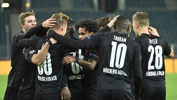 Moenchengladbach's players celebrate after Moenchengladbach's Swiss defender Nico Elvedi (2nd L) scored the 2-0 during the UEFA Champions League group B football match Borussia Moenchengladbach v Shakhtar Donetsk in Moenchengladbach, western Ger