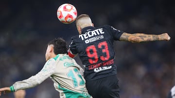 Santos' forward #13 Alberto Ocejo and Monterrey's Spanish defender #93 Sergio Ramos jump to head the ball during the Liga MX Apertura football tournament match between Monterrey and Santos at the BBVA Stadium in Monterrey, Nuevo Leon state, Mexico on September 27, 2025. (Photo by Julio Cesar AGUILAR / AFP)