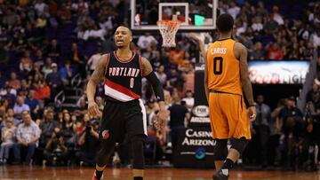 PHOENIX, AZ - MARCH 12: Damian Lillard #0 of the Portland Trail Blazers reacts ahead of Marquese Chriss #0 of the Phoenix Suns during the second half of the NBA game at Talking Stick Resort Arena on March 12, 2017 in Phoenix, Arizona. The Trailblazers defeated the Suns 110-101. NOTE TO USER: User expressly acknowledges and agrees that, by downloading and or using this photograph, User is consenting to the terms and conditions of the Getty Images License Agreement. Christian Petersen/Getty Images/AFP
== FOR NEWSPAPERS, INTERNET, TELCOS & TELEVISION USE ONLY ==