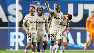 Lens' French forward #38 Rayan Fofana (C) celebrates after scoring Lens' fourth goal during the French L1 football match between Paris FC and RC Lens at the Stade Jean-Bouin in Paris on February 14, 2026. (Photo by ALAIN JOCARD / AFP)