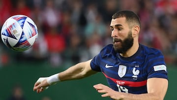 (FILES) In this file photo taken on June 10, 2022 France's forward Karim Benzema controls the ball during the UEFA Nations League football match Austria v France at the Ernst Happel stadium in Vienna, Austria. - Defending champions France will not replace the injured Karim Benzema in their World Cup squad, coach Didier Deschamps said on November 20, 2022. In a huge blow to France's hopes of retaining the trophy in Qatar, Benzema was ruled out after the Ballon d'Or winner injured his left thigh in training on November 19, 2022. (Photo by FRANCK FIFE / AFP)