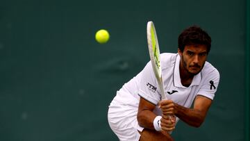 Tennis - Wimbledon - All England Lawn Tennis and Croquet Club, London, Britain - July 4, 2025 Portugal's Francisco Cabral in action during his second round doubles match with Austria's Lucas Miedler against Czech Republic's Petr Nouza and Patrik Rikl REUTERS/Andrew Couldridge