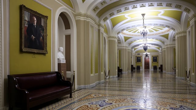 A hallway outside the U.S. Senate chamber sits empty at the U.S. Capitol in the hours before a partial government shutdown in Washington, D.C., U.S., September 30, 2025. REUTERS/Jonathan Ernst