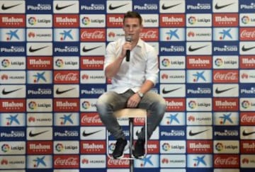 Atletico de Madrid's new signing French forward Kevin Gameiro speaks during his presentation at the Vicente Calderon stadium in Madrid on July 31, 2016. / AFP PHOTO / GERARD JULIEN