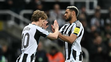 Newcastle United's English midfielder #10 Anthony Gordon (L) comes on for Newcastle United's Brazilian midfielder #07 Joelinton (R) during the UEFA Champion's League knockout round play-off, 2nd leg football match between Newcastle United and Qarabag at St James' Park in Newcastle-upon-Tyne, north east England on February 24, 2026. (Photo by Paul ELLIS / AFP)