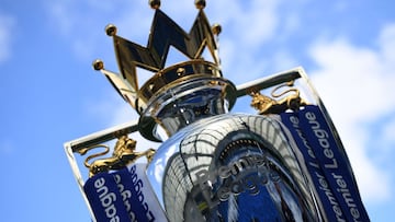 (FILES) In this file photo taken on August 12, 2017 The Premier league trophy is pictured beneath the blue sky ahead of the English Premier League football match between Brighton and Hove Albion and Manchester City at the American Express Community Stadiu