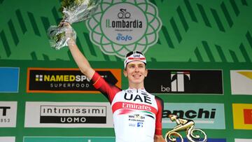 COMO, ITALY - OCTOBER 08: Tadej Pogacar of Slovenia and UAE Team Emirates celebrates at podium as race winner during the 116th Il Lombardia 2022 a 253km one day race from Bergamo to Como / #iLombardia / on October 08, 2022 in Como, Italy. (Photo by Tim de Waele/Getty Images)