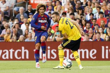 Griezmann y Chambers. 