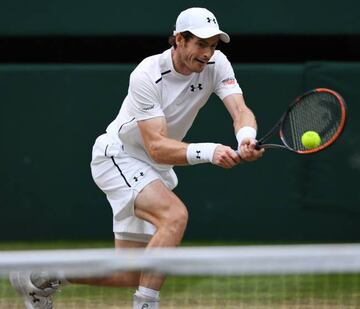 Murray plays a backhand during his quarter-final win over Tsonga.