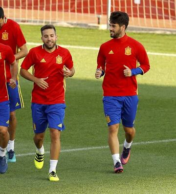 Alba having a joke with Isco at training.