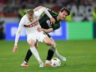Soccer Football - UEFA Europa League - Play Off - Second Leg - VfB Stuttgart v Celtic - MHPArena, Stuttgart, Germany - February 26, 2026 Celtic's Anthony Ralston in action with VfB Stuttgart's Chris Fuhrich REUTERS/Heiko Becker
