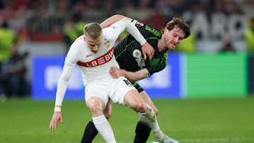 Soccer Football - UEFA Europa League - Play Off - Second Leg - VfB Stuttgart v Celtic - MHPArena, Stuttgart, Germany - February 26, 2026 Celtic's Anthony Ralston in action with VfB Stuttgart's Chris Fuhrich REUTERS/Heiko Becker