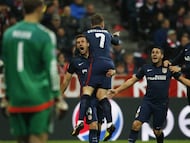 Atletico players celebrate Griezmann's goal against Bayern.