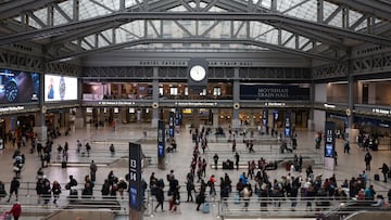 Travelers wait for Amtrak trains inside the Daniel Patrick Moynihan Train Hall at Pennsylvania Station ahead of the Thanksgiving holiday in Manhattan in New York City, New York, U.S., November 21, 2023. REUTERS/Mike Segar