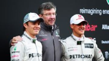 PASADO EN ROJO. Schumacher y Brawn conocen bien la &lsquo;Scuderia&rsquo;.
 