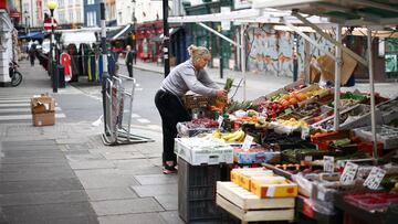 Kelly Wakeling arranges produce at her market stall ALK Fruit and Veg on Portobello Road, in London, Britain, May 30, 2022. REUTERS/Henry Nicholls