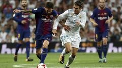 Kovacic y Messi.