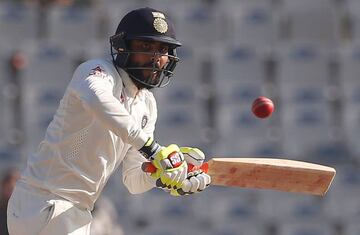 Jadeja plays a shot for India.