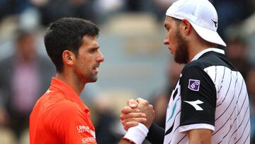 PARIS, FRANCE - JUNE 03: Novak Djokovic of Serbia shakes hands with Jan-Lennard Struff of Germany following their mens singles fourth round match during Day nine of the 2019 French Open at Roland Garros on June 03, 2019 in Paris, France. (Photo by Julian Finney/Getty Images)