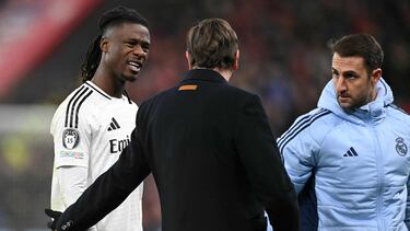 Real Madrid's French midfielder #06 Eduardo Camavinga (L) reacts as he leaves the pitch after being substituted off injured during the UEFA Champions League football match between Liverpool and Real Madrid at Anfield in Liverpool, north west England on November 27, 2024. (Photo by Oli SCARFF / AFP)