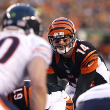 Aug 29, 2015; Cincinnati, OH, USA; Cincinnati Bengals quarterback Andy Dalton (14) prepares for the snap in the first half against the Chicago Bears in a preseason NFL football game at Paul Brown Stadium. Mandatory Credit: Aaron Doster-USA TODAY Sports