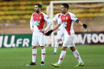 Monaco's Cesc Fàbregas and Radamel Falcao react during last night's tie