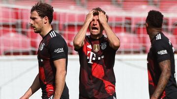 Bayern Munich&#039;s German forward Thomas Mueller (C) reacts during the German first division Bundesliga football match Mainz 05 vs FC Bayern Munich, in Mainz, western Germany, on April 24, 2021. (Photo by KAI PFAFFENBACH / POOL / AFP) / DFL REGULATIONS 