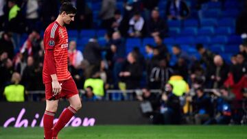 Real Madrid's Belgian goalkeeper Thibaut Courtois reacts at the end of the UEFA Champions League round of 16 second leg football match between Real Madrid CF and Ajax at the Santiago Bernabeu stadium in Madrid on March 5, 2019. (Photo by JAVIER SORI