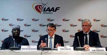 Sebastian Coe (centre), IAAF's President, Rune Andersen, head of the IAAF taskforce on Russia (right) and Hamad Kalkaba Malboum (left), President of the Confederation of African Athletics (CAA) attend a press conference as part of the International Associ