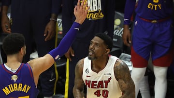 MIAMI, FLORIDA - JUNE 07: Udonis Haslem #40 of the Miami Heat shoots against Jamal Murray #27 of the Denver Nuggets during the fourth quarter in Game Three of the 2023 NBA Finals at Kaseya Center on June 07, 2023 in Miami, Florida. NOTE TO USER: User expressly acknowledges and agrees that, by downloading and or using this photograph, User is consenting to the terms and conditions of the Getty Images License Agreement.   Megan Briggs/Getty Images/AFP (Photo by Megan Briggs / GETTY IMAGES NORTH AMERICA / Getty Images via AFP)