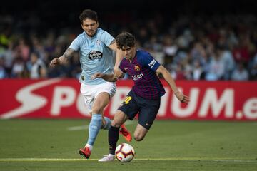 Okay Yokuslu y Thomas Vermaelen.