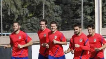 <b>CONTENTOS. </b>El Atlético tuvo ayer una sesión relajada.