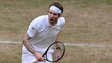 Kazakhstan's Alexander Bublik reacts during the men's singles semi-final match against Russia's Karen Khachanov (not in picture) at the Halle Open ATP tennis tournament in Halle, western Germany, on June 21, 2025. (Photo by CARMEN JASPERSEN / AFP)