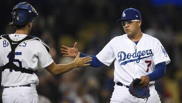 LOS ANGELES, CA - MAY 06: Pitcher Julio Urias #7 of the Los Angeles Dodgers celebrates with catcher Austin Barnes #15 after defeating the Atlanta Braves, 5-3, at Dodger Stadium on May 6, 2019 in Los Angeles, California.   Kevork Djansezian/Getty Images/AFP
 == FOR NEWSPAPERS, INTERNET, TELCOS &amp; TELEVISION USE ONLY ==