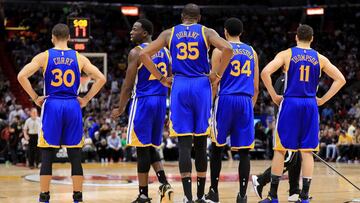 The Golden State Warriors line up during a game against the Miami Heat at American Airlines Arena on January 23, 2017 in Miami, Florida.