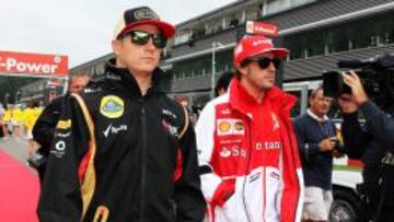 Kimi Raikkonen junto a Fernando Alonso. 