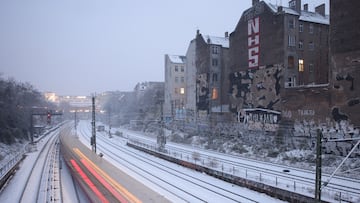 A train rides along the rails during snowfall in Berlin, Germany, November 29, 2023. REUTERS/Lisi Niesner