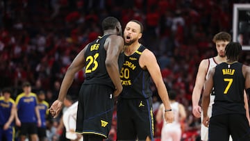 Golden State Warriors guard Stephen Curry (30) celebrates with forward Draymond Green (23) after a play during game seven of the first round for the 2025 NBA Playoffs against the Houston Rockets at Toyota Center.