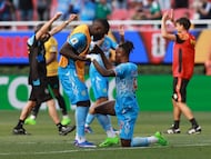 Soccer Football - FIFA World Cup - Inter-Confederation Playoffs - Final - DR Congo v Jamaica - Estadio Guadalajara, Guadalajara, Mexico - March 31, 2026 DR Congo's Brian Cipenga and Arthur Masuaku celebrate qualifying for the FIFA World Cup REUTERS/Henry Romero