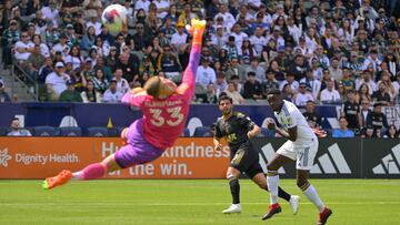 Apr 16, 2023; Carson, California, USA; Los Angeles FC forward Carlos Vela (10) scores a goal past Los Angeles Galaxy goalkeeper Jonathan Klinsmann and midfielder Memo Rodriguez (17) in the first half at Dignity Health Sports Park. Mandatory Credit: Jayne Kamin-Oncea-USA TODAY Sports