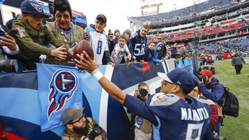 NASHVILLE, TN - NOVEMBER 11: Marcus Mariota #8 of the Tennessee Titans gives the game ball to a fan after the game against the New England Patriots at Nissan Stadium on November 11, 2018 in Nashville, Tennessee.   Wesley Hitt/Getty Images/AFP
 == FOR NEWSPAPERS, INTERNET, TELCOS &amp; TELEVISION USE ONLY ==