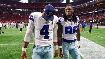 ATLANTA, GEORGIA - NOVEMBER 03: Dak Prescott #4 and CeeDee Lamb #88 of the Dallas Cowboys walk off the field after a a loss to the Atlanta Falcons at Mercedes-Benz Stadium on November 03, 2024 in Atlanta, Georgia. Kevin C. Cox/Getty Images/AFP (Photo by Kevin C. Cox / GETTY IMAGES NORTH AMERICA / Getty Images via AFP)
