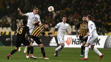 Dynamo Kiev&#039;s Vitaliy Buyalskiy (L) vies for the ball with AEK&#039;s Kostas Galanopoulos (R) during the UEFA Europa League round of 32 football match between AEK Athens and Dynamo Kiev at the OAKA stadium in Athens on February 15, 2018.  / AFP PHOTO
