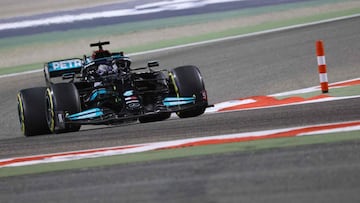 Mercedes&#039; British driver Lewis Hamilton drives during the Bahrain Formula One Grand Prix at the Bahrain International Circuit in the city of Sakhir on March 28, 2021. (Photo by Giuseppe CACACE / AFP)